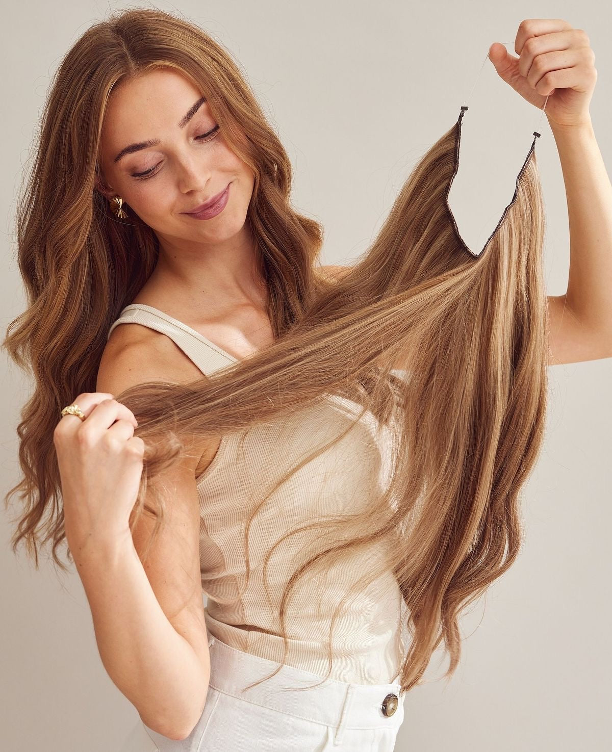 Extensiones HILO INVISIBLE©️ CABELLO NATURAL 100%  (66 CM)
